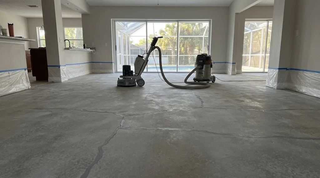 Grinding equipment preparing an interior concrete slab