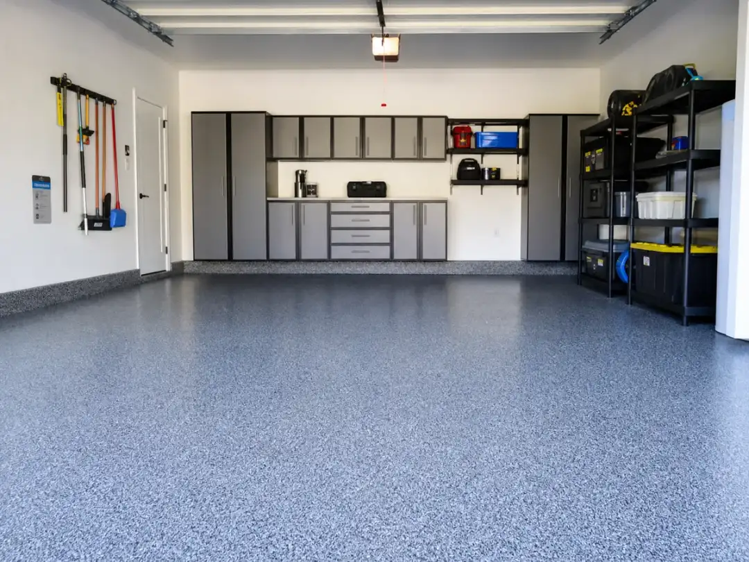 Charcoal flake garage coating with clean stem walls in Pinellas Park, Florida