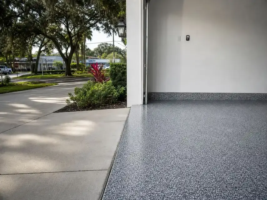 Pirate Cove Epoxy Pirate Cove Epoxy crew working on concrete coating for a Town n Country property